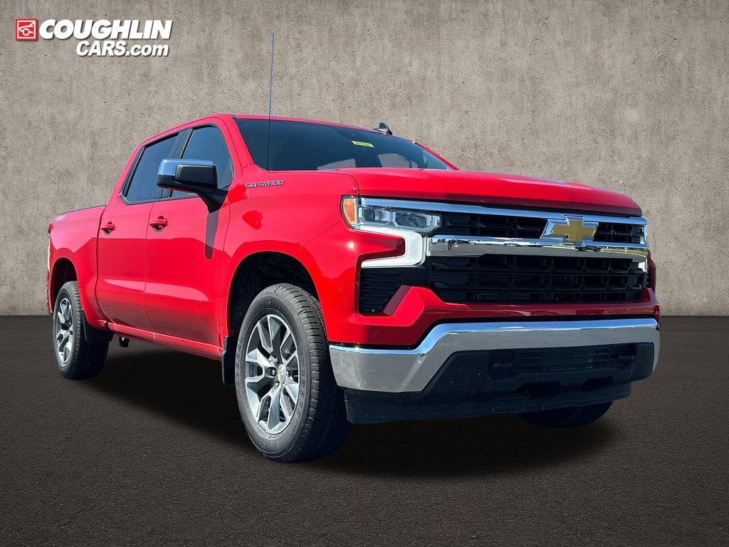2026 Chevrolet Silverado 1500 LT (2FL) in Red Hot — front three-quarter view