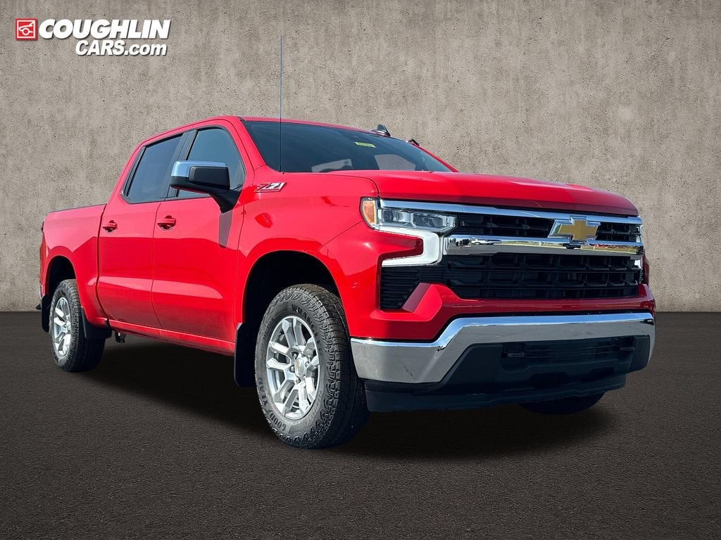 2026 Chevrolet Silverado 1500 LT in Red Hot — front three-quarter view